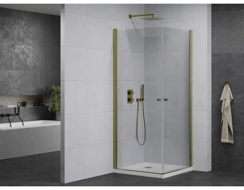 Mexen Pretoria Duo, sprchovací kút s 2-krídlovými dverami 70 (dvere) x 70 (dvere) cm, 6mm číre sklo, zlatý profil + slim sprchová vanička 5cm biela so zlatým sifónom, 852-070-070-50-02-4010G