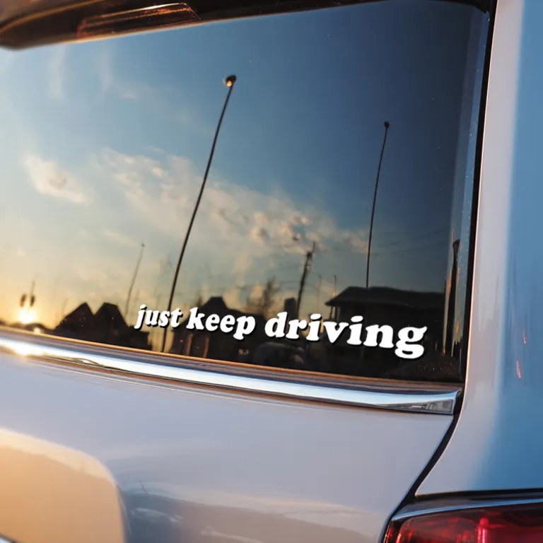 Nálepka na zrkadlo S39 – Just keep driving