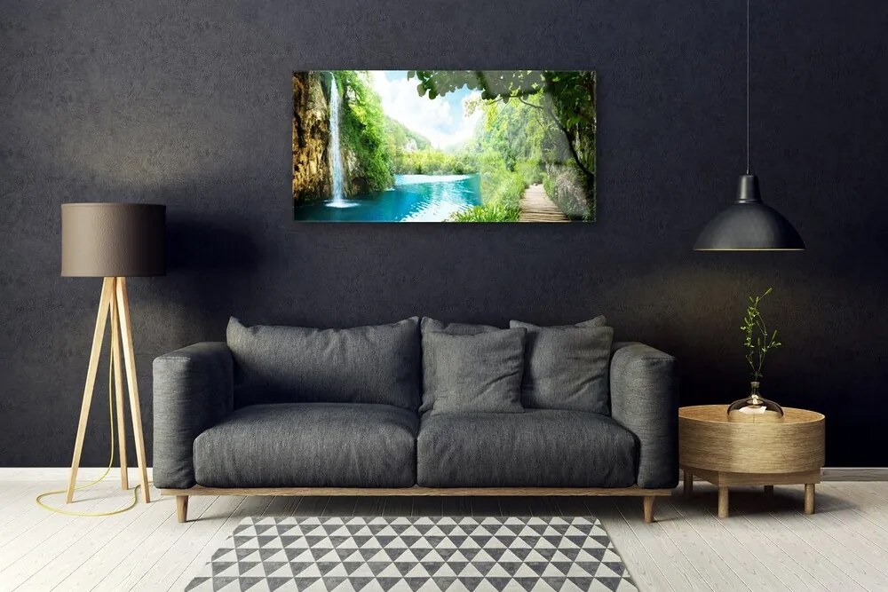 Obraz na skle Vodopád jazero príroda 140x70 cm