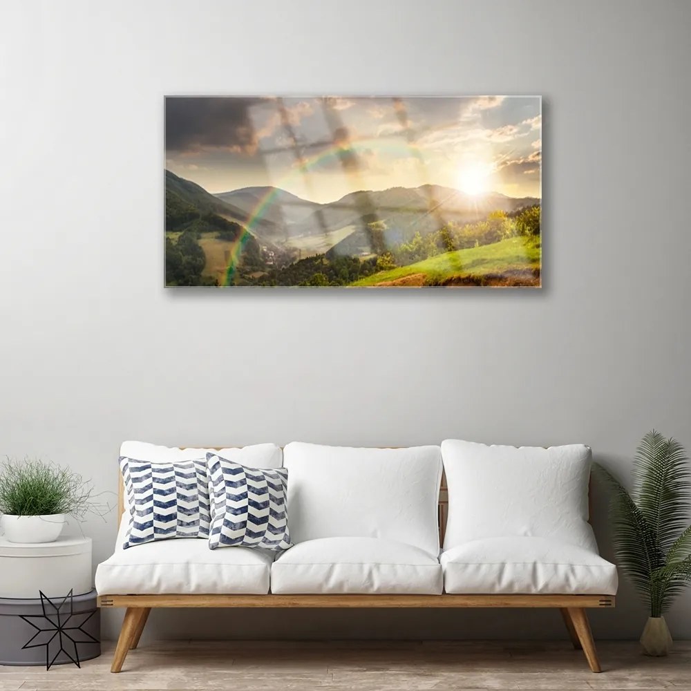 Skleneny obraz Lúka hory západ slnka 125x50 cm