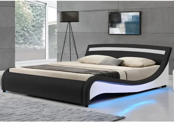 Čalúnená posteľ ,,Malaga" 140 x 200 cm s LED panelmi po bokoch - čierna