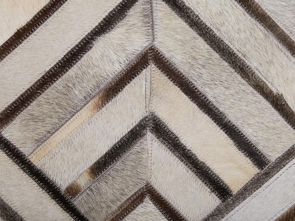 Kožený koberec 160 x 230 cm béžový TEKIR Beliani