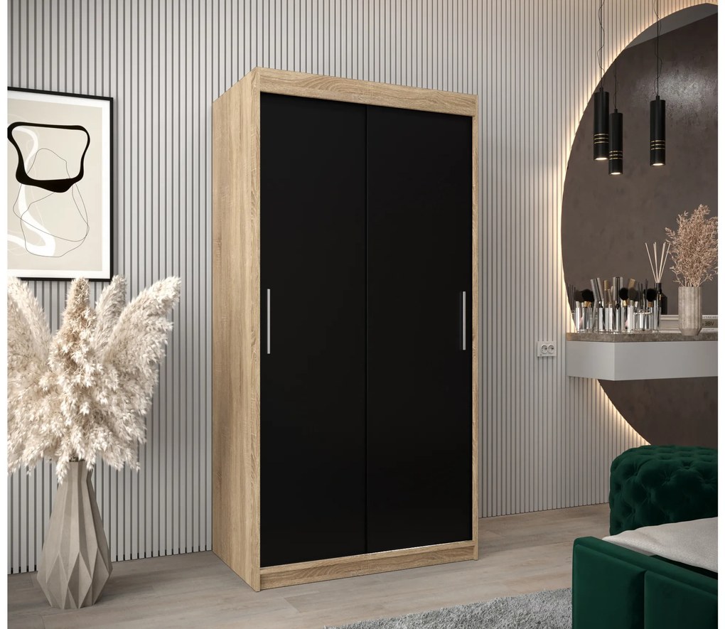 Šatníková skriňa 100 cm Toki (Dub sonoma + Čierna matná). Akcia -50%. Vlastná spoľahlivá doprava až k Vám domov. 1064801
