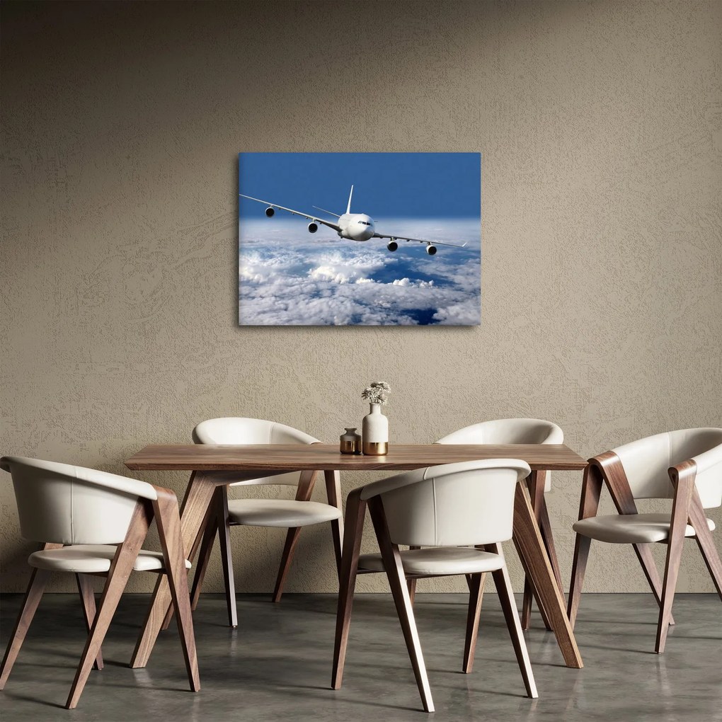 Obraz - Lietadlo v oblakoch (70x50 cm)