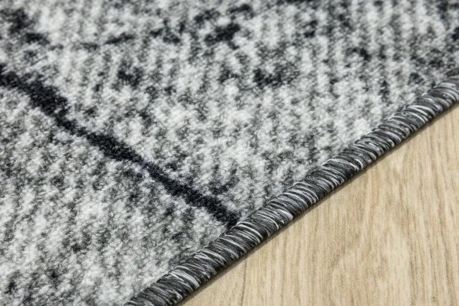 Metrážny koberec Grain 19 sivý