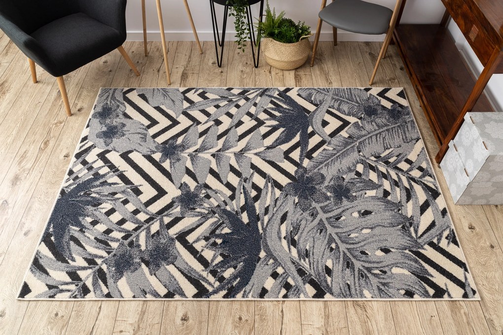 Koberec HEOS 78540 krémovo / modrý LISTY DŽUNGLE