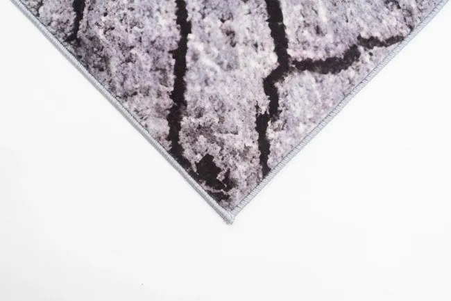 Protišmykový koberec NOVO peň / sivý