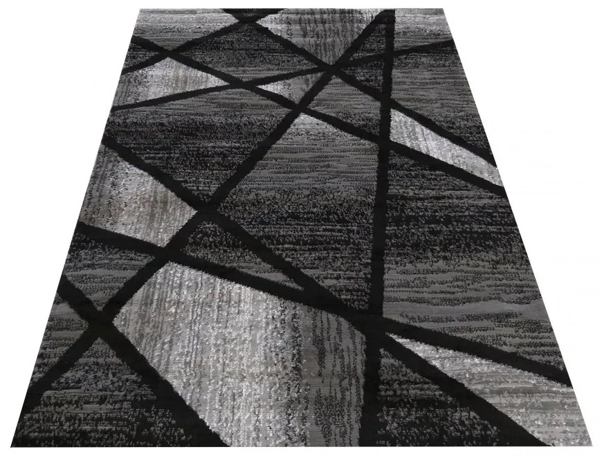 Moderný sivo čierny koberec s abstraktným vzorom Šírka: 80 cm | Dĺžka: 150 cm