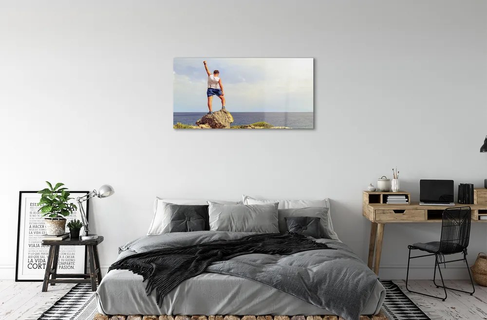 Obraz plexi Muž morská oblohy 100x50 cm