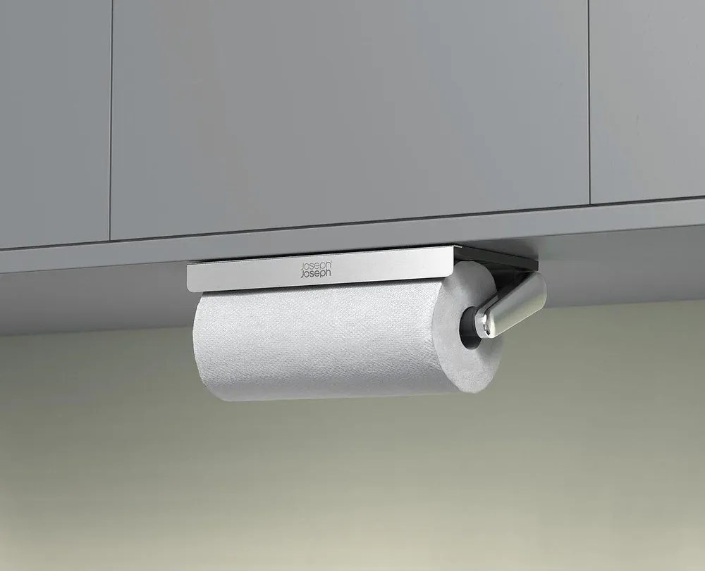 Nástenný plastový držiak na papierové utierky v striebornej farbe RollGrip – Joseph Joseph