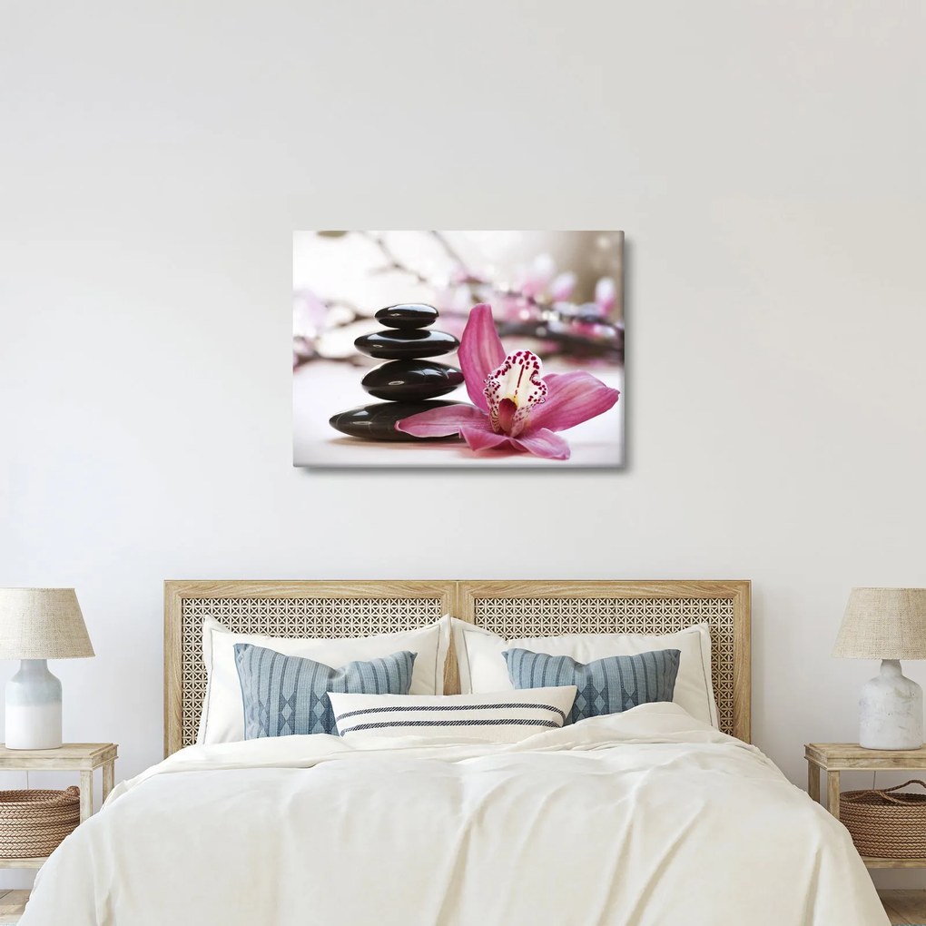 Obraz masážnych kameňov a orchidey na vode (70x50 cm)
