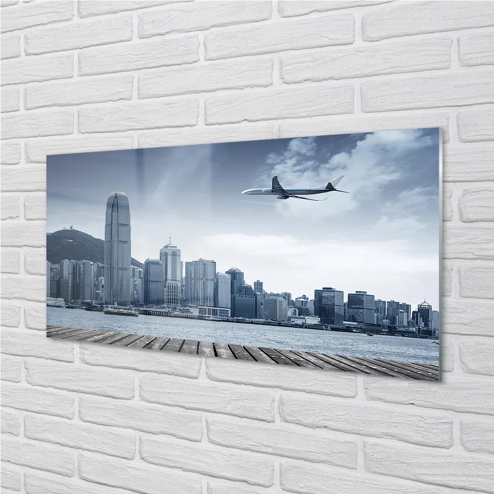 Obraz plexi Lietadiel mraky město 100x50 cm