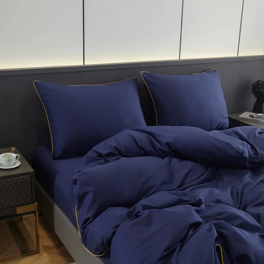 Dekorstudio Elegantné posteľné obliečky s lemovkou PGW - 04 v granátovomodrej farbe