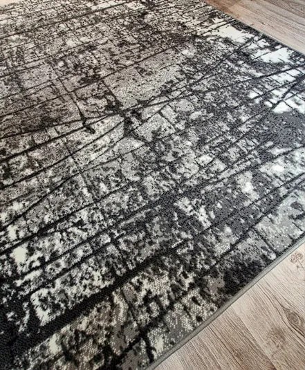 Klasický sivý koberec Shiraz BCF s bodkovaným vzorom Rozmer: 80x350 cm