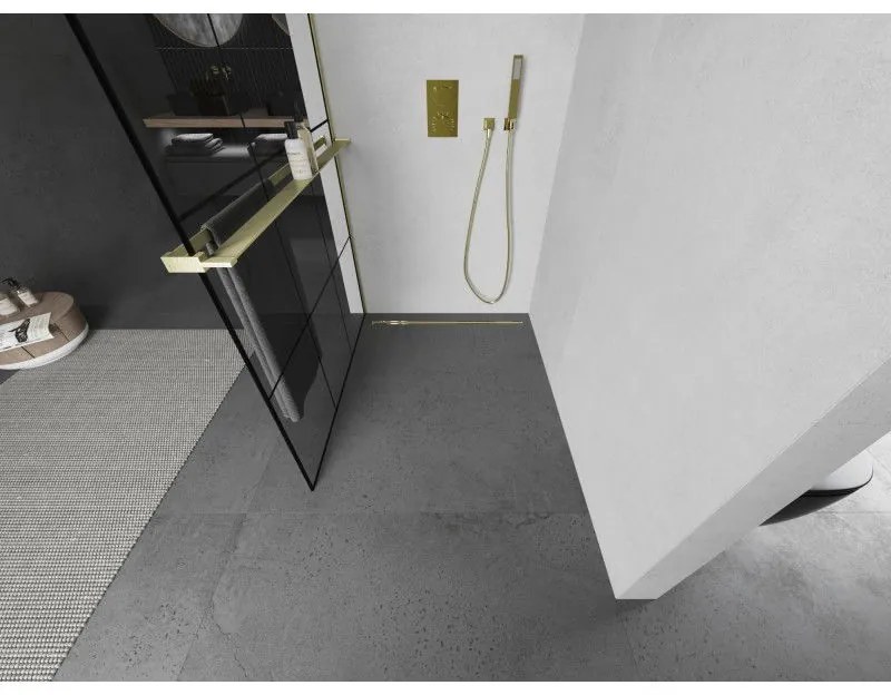 Mexen Kioto+, sprchová zástena Walk-In s poličkou a vešiakom 120 x 200 cm, 8mm číre sklo čierny vzor, zlatý matný profil, 800-120-121-55-77