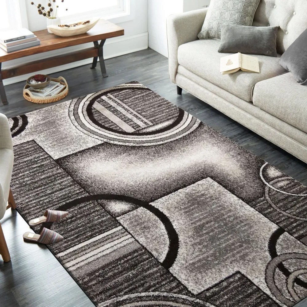 Originálny sivo hnedý koberec s motívom abstraktných kruhov Šírka: 120 cm | Dĺžka: 170 cm