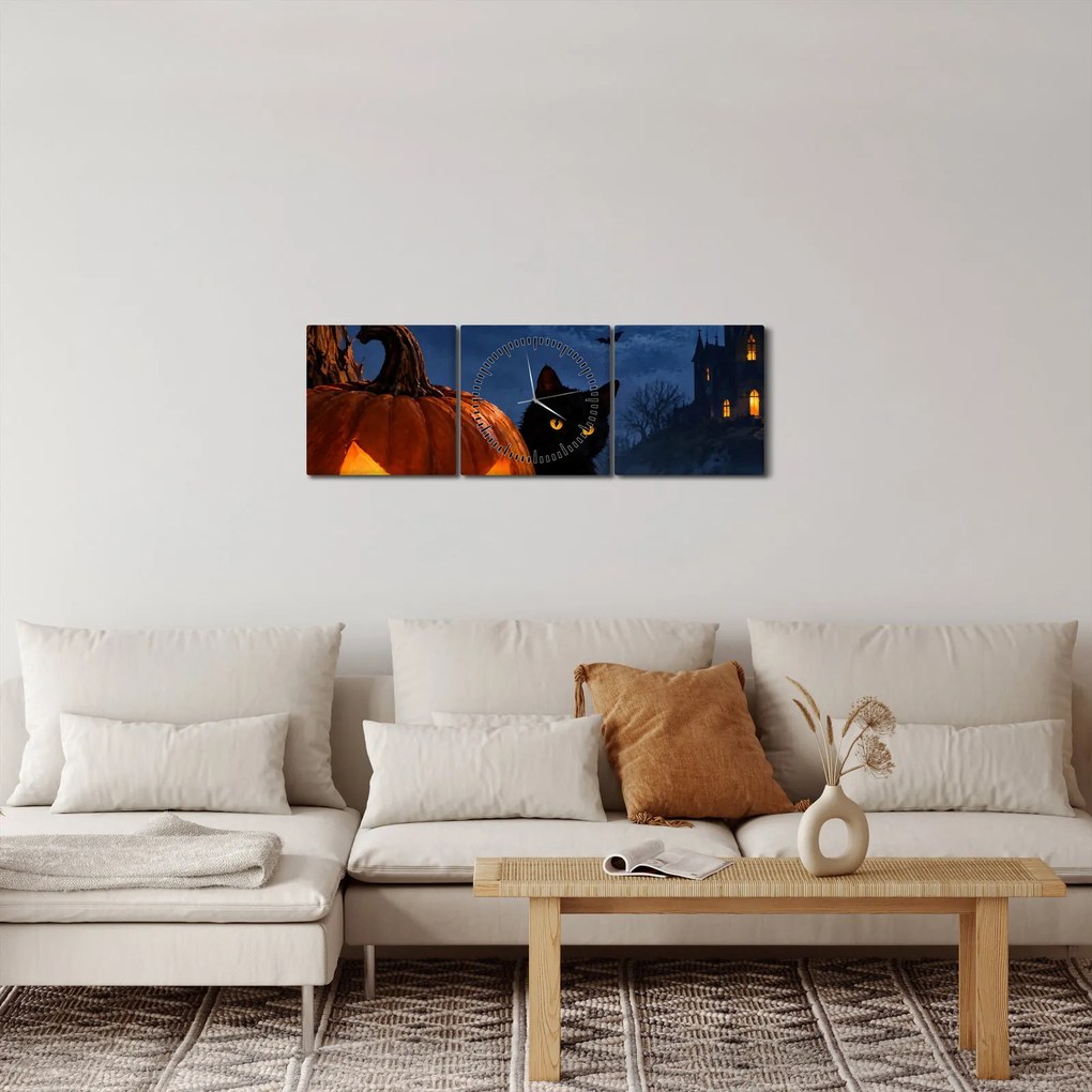 Obraz - Čierna mačka pri svietiacej tekvici na Halloween (s hodinami) (90x30 cm)
