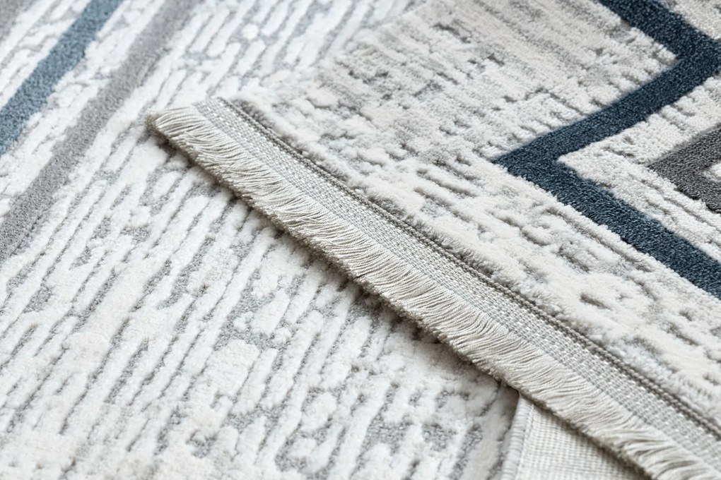 Koberec TULS 51242 s rámikom, slonovinová modrá