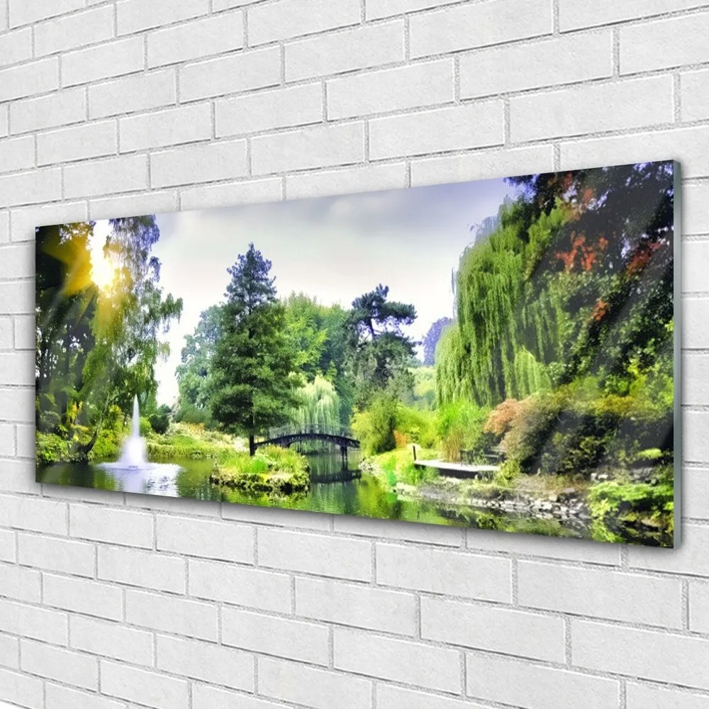 Obraz na akrylátovom skle Les vodopád slnko príroda 125x50 cm