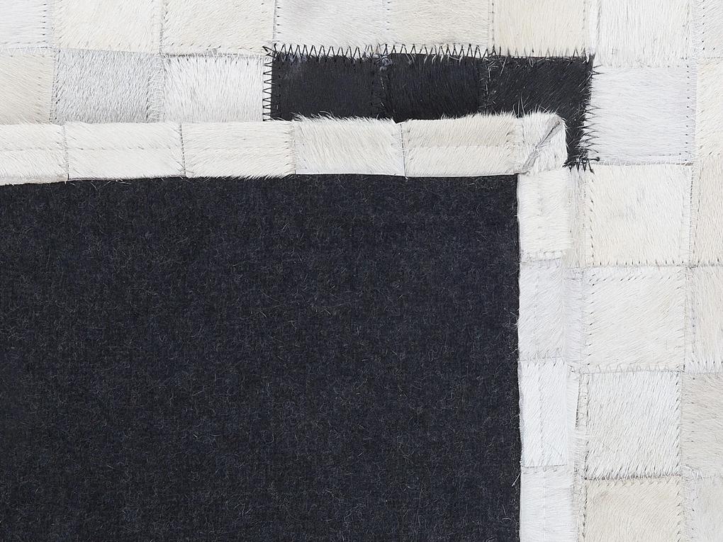Kožený koberec 160 x 230 cm čierna/biela BOLU Beliani
