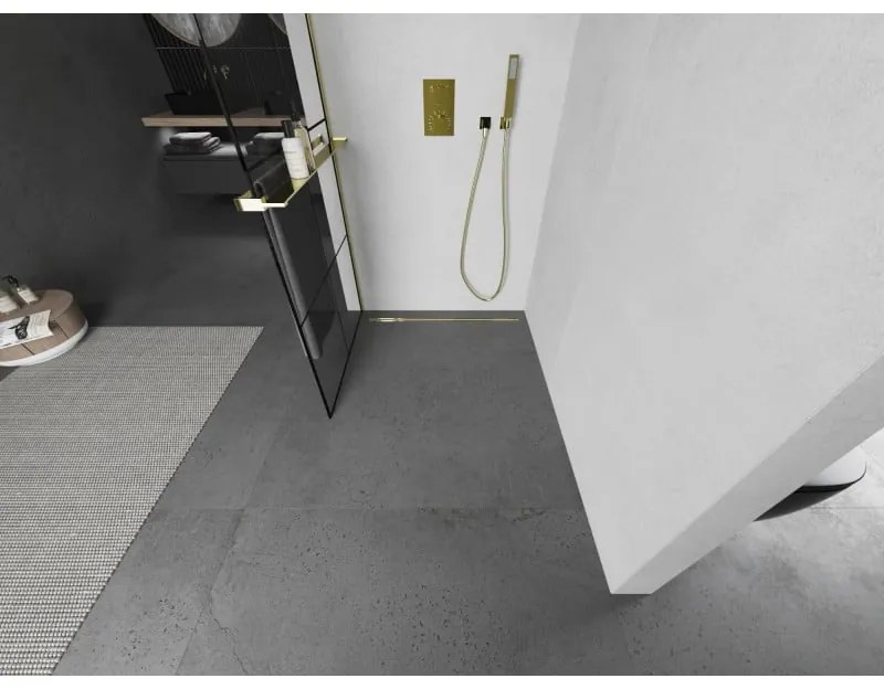 Mexen Kioto+, sprchová zástena s poličkou a držiakom na uteráky 70 x 200 cm, 8mm číre sklo vzor čierny, zlatý profil, 800-070-121-50-77