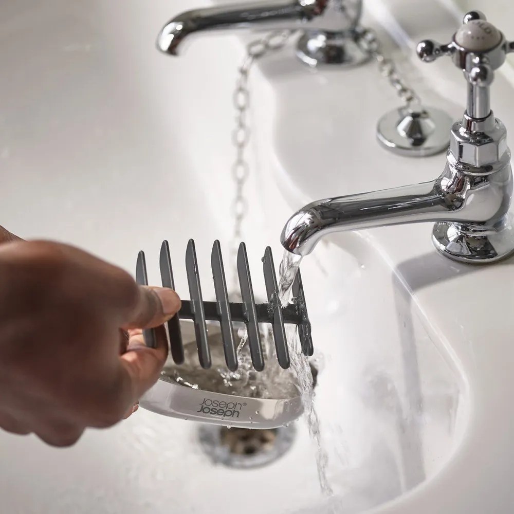 Nádobka na mydlo z nehrdzavejúcej ocele v lesklej striebornej farbe EasyStore Luxe – Joseph Joseph