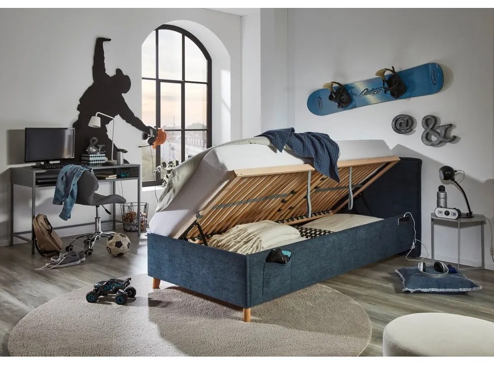 Tmavomodrá čalúnená detská posteľ s úložným priestorom s roštom 90x200 cm Fun – Meise Möbel