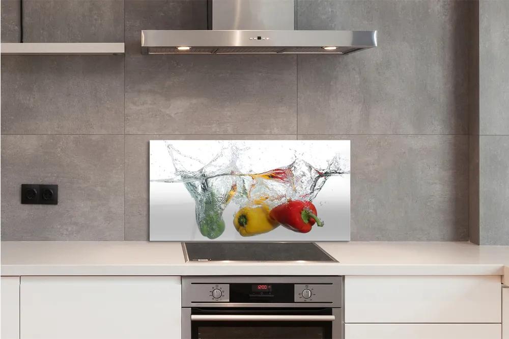 Sklenený obklad do kuchyne Farebné papriky vo vode 140x70 cm