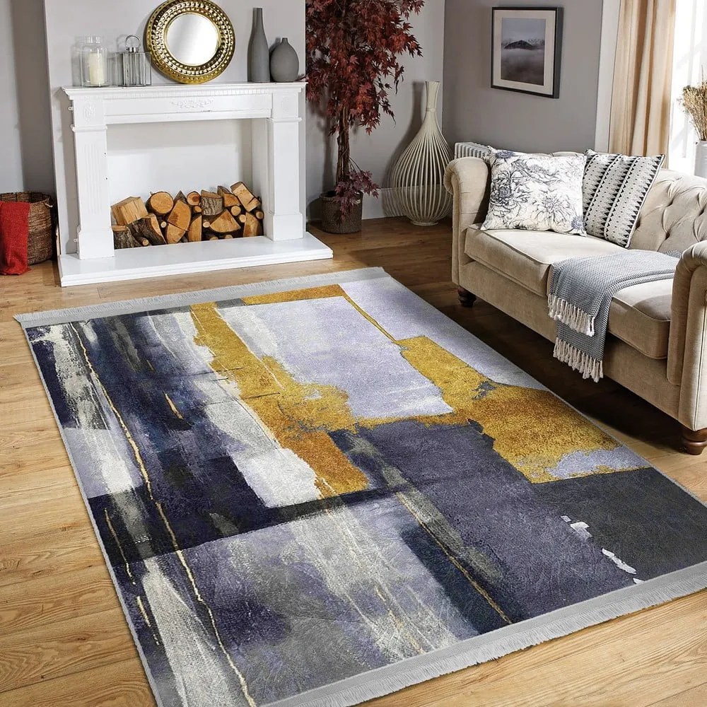 Žltý/tmavomodrý prateľný koberec 80x150 cm Unique – Mila Home