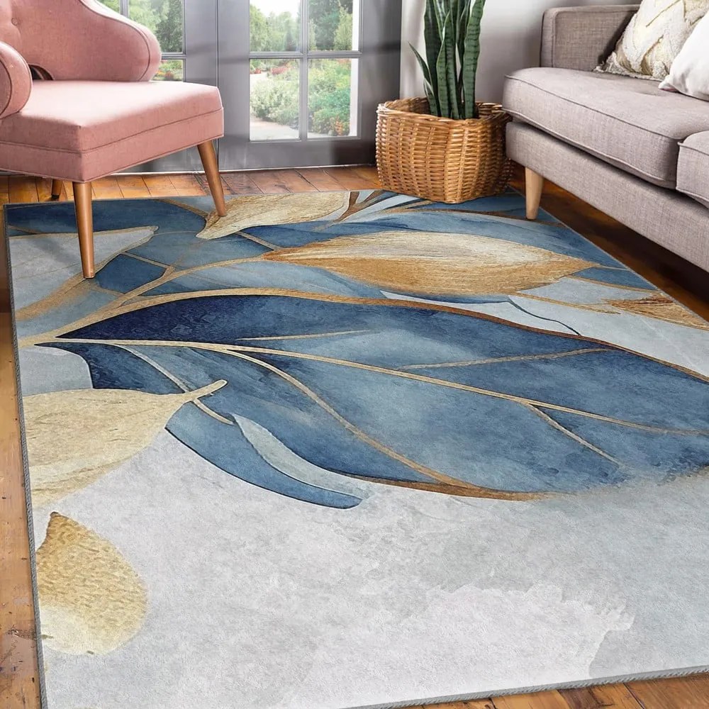 Prateľný koberec v modrej a zlatej farbe 120x180 cm Golden Leaves – Mila Home