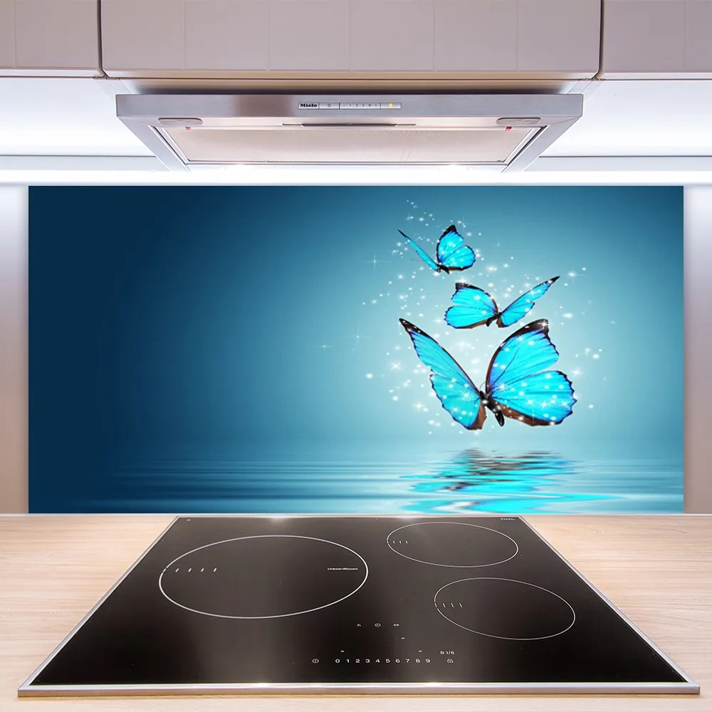 Sklenený obklad Do kuchyne Motýle voda umenie 140x70 cm
