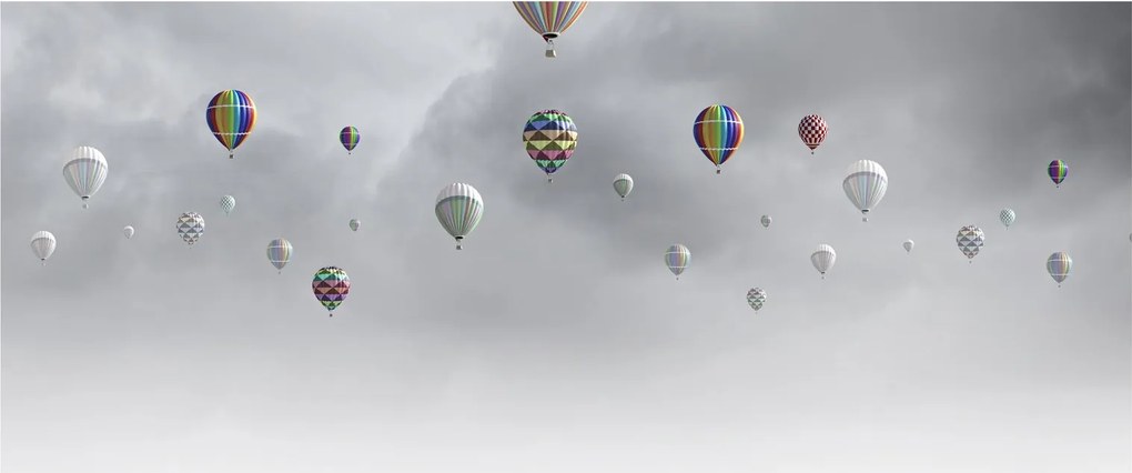 Obraz - Balóny nad tehlovou stenou (120x50 cm)