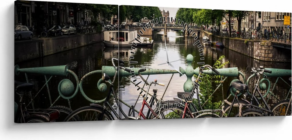 Obraz bicykla v meste (s hodinami) (90x30 cm)
