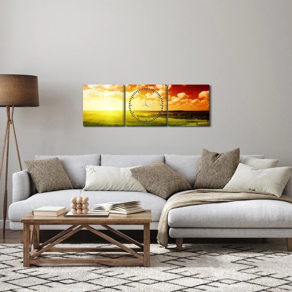 Obraz lúky so žiariacim slnkom (s hodinami) (90x30 cm)