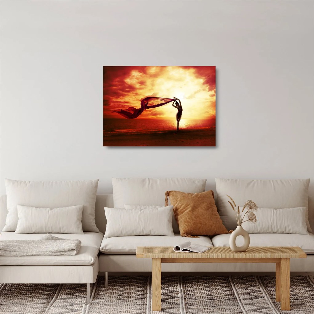 Sklenený obraz - Silueta ženy v západu slnka (70x50 cm)