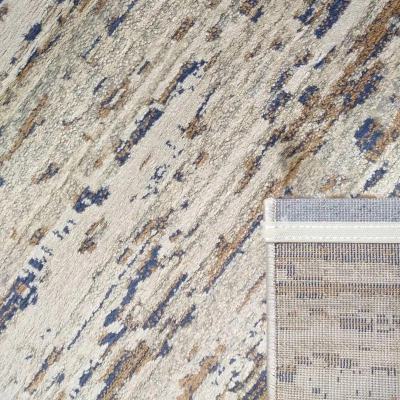 Dizajnový koberec s melírovaním hnedej béžovej a modrej farby