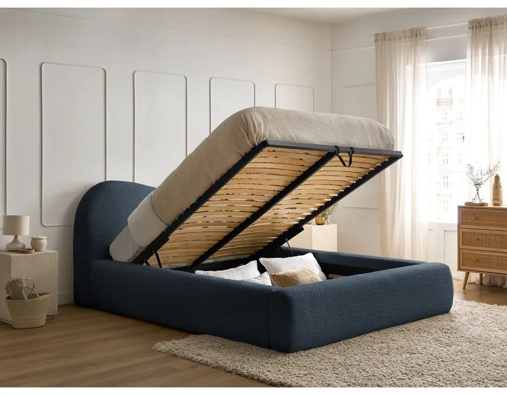 Tmavomodrá čalúnená dvojlôžková posteľ s úložným priestorom s roštom 160x200 cm Orlane – Bobochic Paris