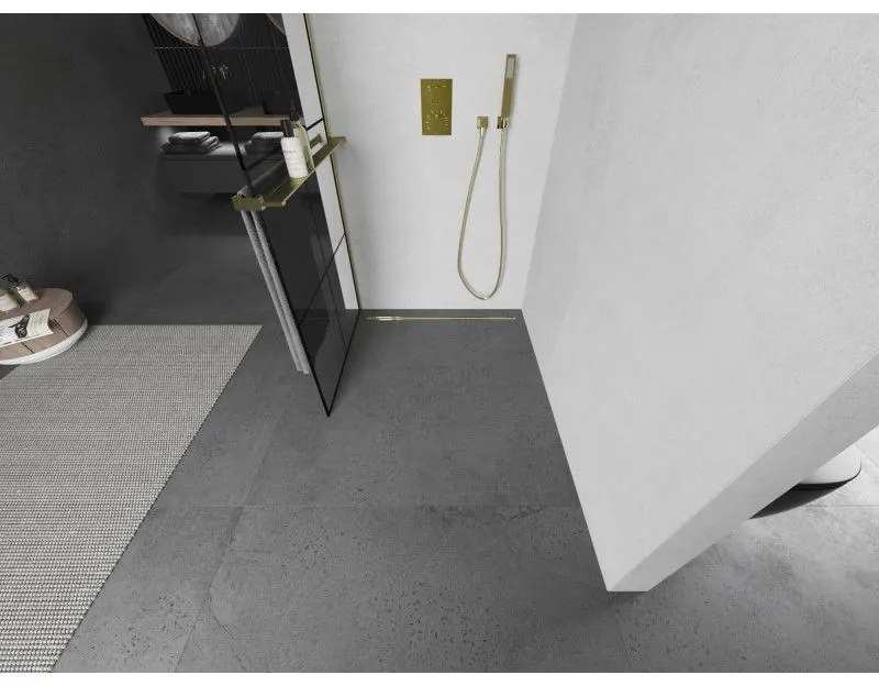 Mexen Kioto+, sprchová zástena Walk-In s poličkou a vešiakom 90 x 200 cm, 8mm číre sklo čierny vzor, zlatý matný profil, 800-090-121-55-77