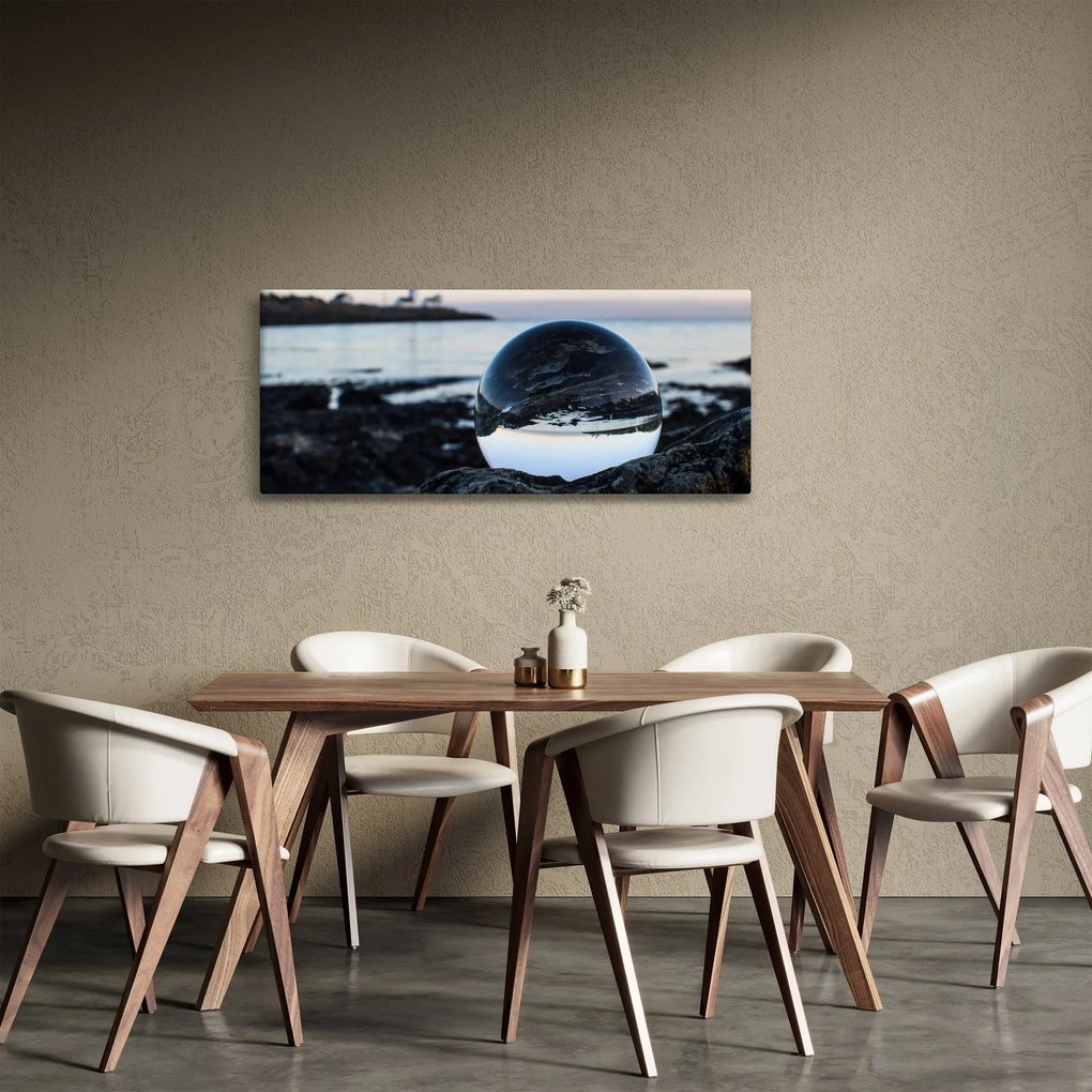 Obraz sklenené gule na skale (120x50 cm)
