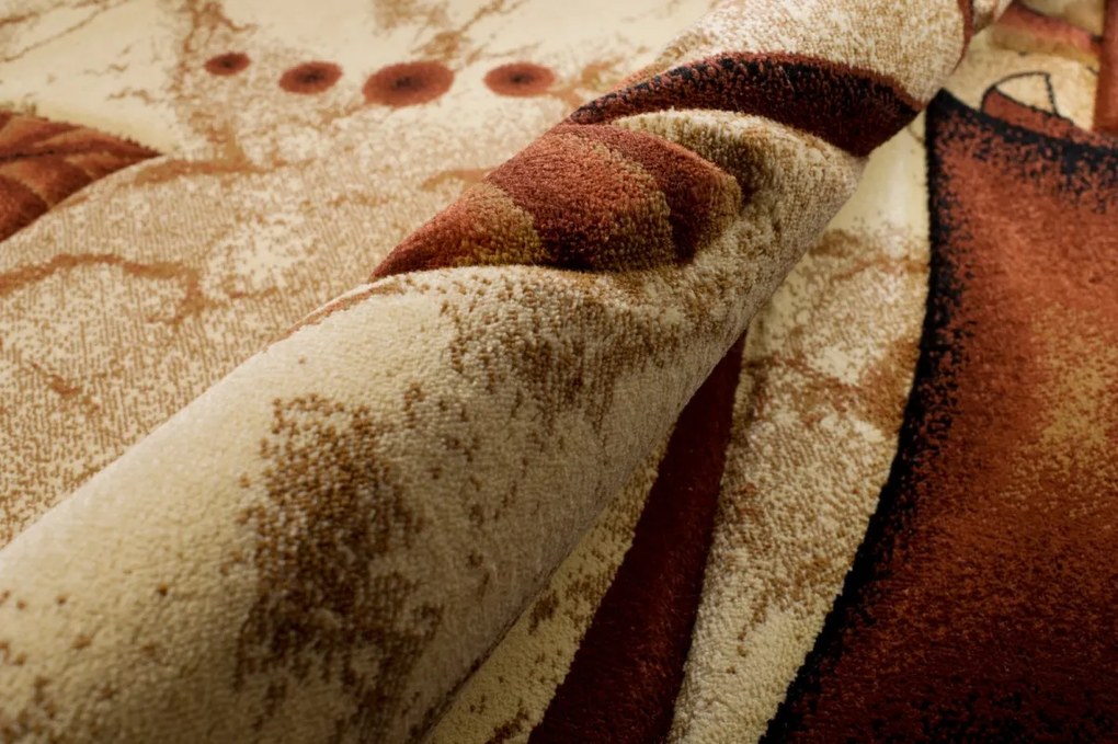 TA Koberec 9106A HNEDÁ ANTOGYA Rozmer: 110x265 cm