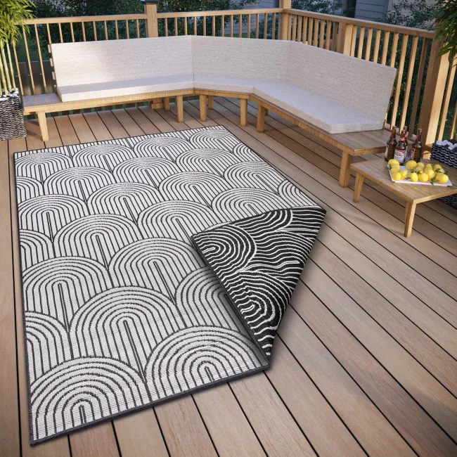 Obojstranný koberec Hanse Home Pangli čierny