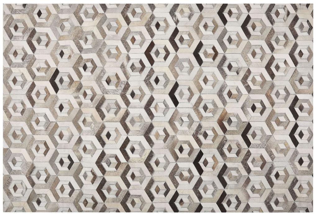 Kožený koberec 160 x 230 cm hnedá/béžová TAVAK Beliani