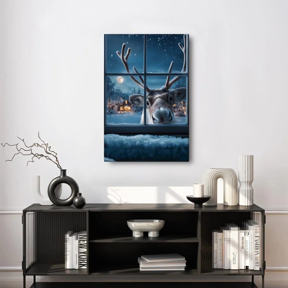 Vianočný obraz roztomilý sob za zasneženým oknom