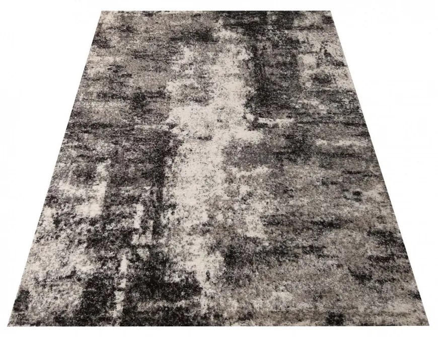 Brilatný béžovo hnedý koberec s jemným abstraktným motívom Šírka: 60 cm | Dĺžka: 100 cm