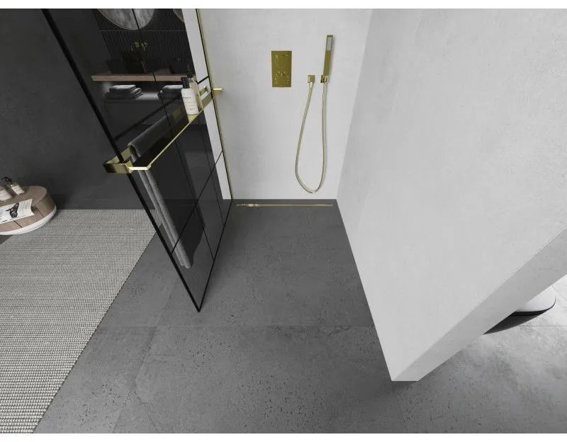 Mexen Kioto+ L, sprchová zástena Walk-In s poličkou a vešiakom 100 x 200 cm, 8mm číre sklo čierny vzor, zlatý lesklý profil,800-100-123-50-77