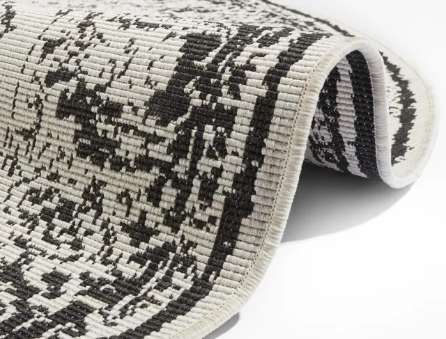 Obojstranný koberec Hanse Home Twin Supreme Borbon čierny / krémový kruh