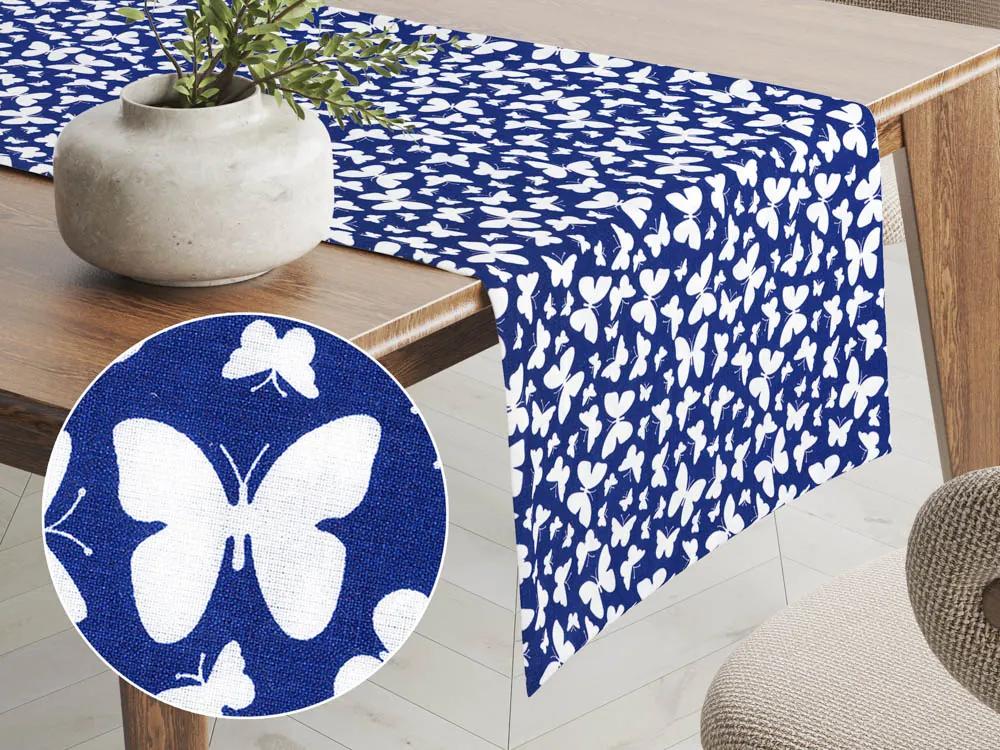 Biante Bavlnený behúň na stôl Sandra SA-376 Biele motýliky na modrom 20x180 cm