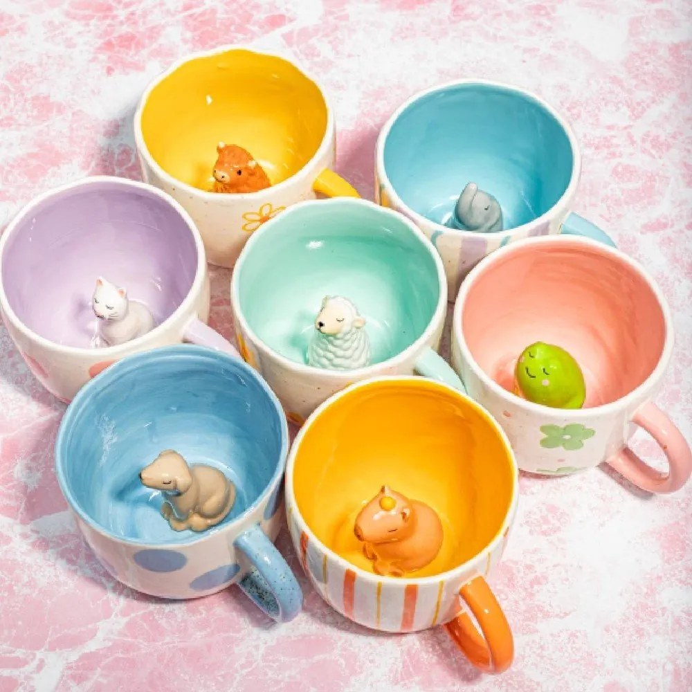 Žltý/krémový porcelánový hrnček 350 ml Surprise Highland Cow – Sass & Belle