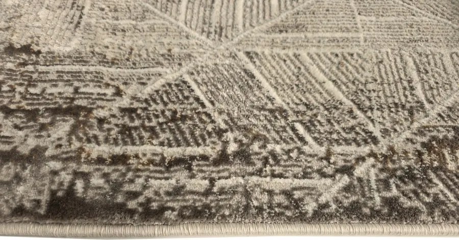 DC Koberec Oman 618 tmavá vizion zlatá Rozmer: 200×290 cm