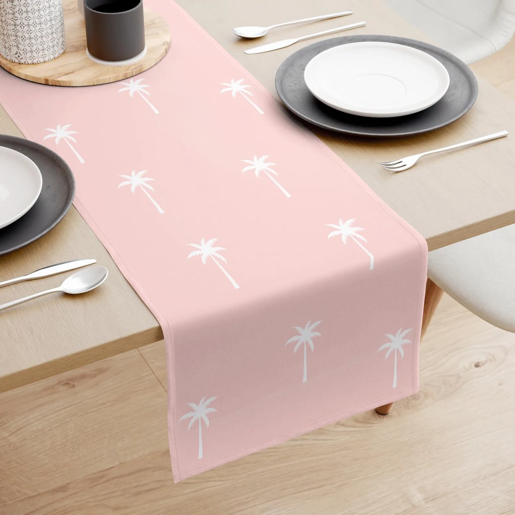 Goldea behúň na stôl 100% bavlnené plátno - palmy na pastelovo ružovej 50x160 cm